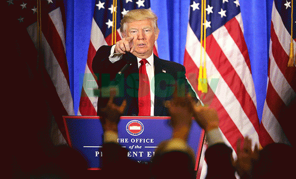 President-elect Do<em></em>nald Trump takes questions at a news co<em></em>nference at Trump Tower on Jan. 11 in New York City. This was Trump's first official news co<em></em>nference since the November elections. (Photo by Spencer Platt/Getty Images)